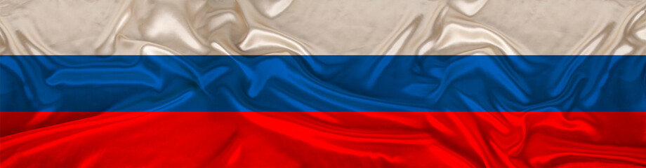 long panorama of the national flag of the state of Russia on delicate silk with folds, the concept...
