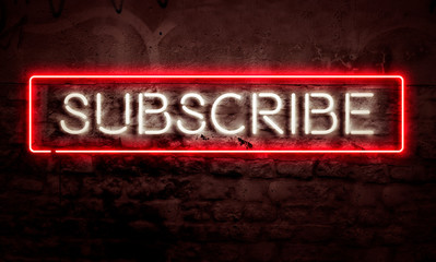 Subscribe Graphic Neon Sign On Brick Wall For Social Media Videos