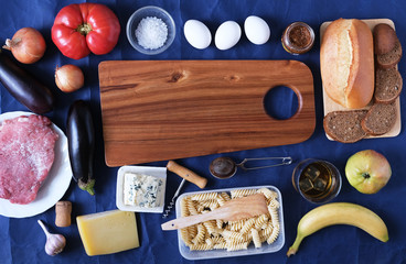 table with food, cutting board with space for text