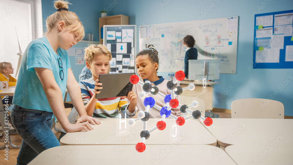 Aufkleber three diverse school children in chemistry science class use digital tablet computer with augmented 