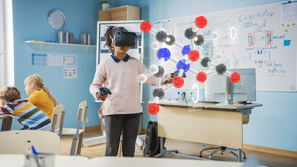 Cute Girl Wearing Augmented Reality Headset and Using Controllers Interacts with 3D Molecule....