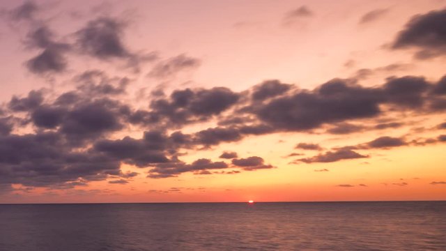 sunset set time lapse over the ocean