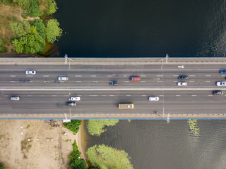 Aerial drone view. Cars travel along the North Bridge across the Dnieper in Kiev.