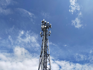 Signal towers with sky in background.