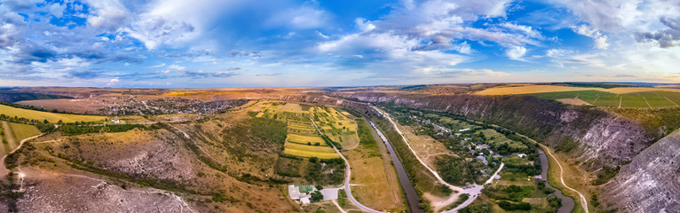 Aerial drone view of Orheiul Vechi village panorama in Moldova at sunset