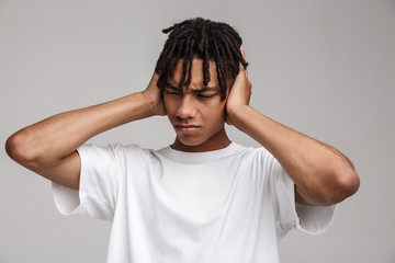 Portrait of an angry young man in t-shirt