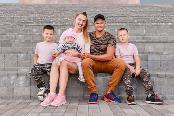 Fototapeta premium beautiful young family of five