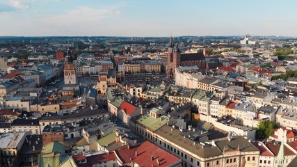 Naklejka na ściany i meble Aerial view of Krakow, the main square in the city center with St. Mary's Church.