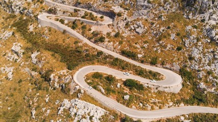 Aerial View, Car Driving Up a Curvy Mountain Road in Spain. Mallorca, Serra de Tramuntana.