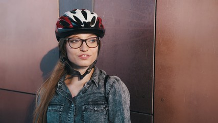 Portrait shot of young caucasian woman. Getting ready for rollerblading. High quality photo