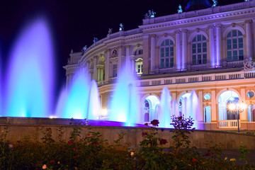 Fototapeta premium night view of Opera house in Odessa city, Ukraine. Beautiful city Park and street illumination
