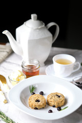 Blueberry scones. a Traditional British baked good for tea time. set on cafe table.