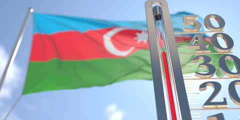Thermometer shows high air temperature against blurred flag of Azerbaijan. Hot weather forecast related 3D rendering