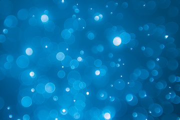 abstract light bokeh with navy blue  background