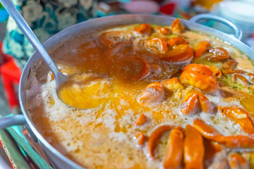 Close focus of Vietnamese braised beef offal or beef offal stew ( pha lau ): It's a popular snack in southern Vietnam, Vietnamese street food.