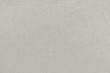 Gray homogeneous background with a textured surface, fabric.