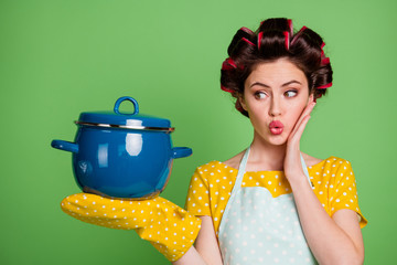 Photo of attractive lady cooking curlers hairdo housewife hold ready meal dish soup big pan hand on...