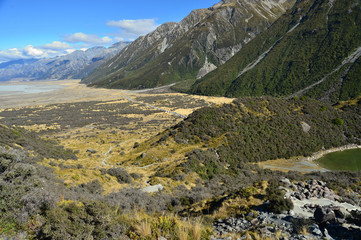 Fototapeta na wymiar Mountain and farm on scenic road Queenstown New Zealand