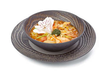 Chicken soup with noodles isolated on white