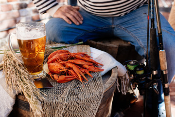 Crayfish and beer and man in singlet