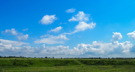 photo of a Russian large field above a cloudy sky