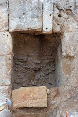Opening in a stone antique wall