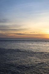 Fototapeta na wymiar Sunset Over the Angel's Billabong beach on Nusa Penida Island, Bali, Indonesia. Amazing view of Indian Ocean 