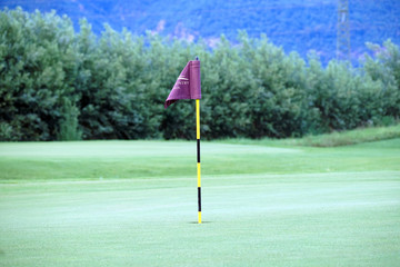 Obraz premium Flag on the green of the Blue Monster golf course.