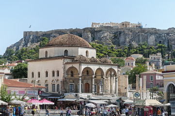 Tzistarakis Mosque in Monastiraki Square and the Acropolis and Parthenon in the background in Athens, Greece