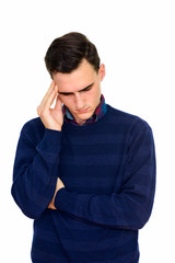 Studio shot of stressed Caucasian man thinking isolated against white background