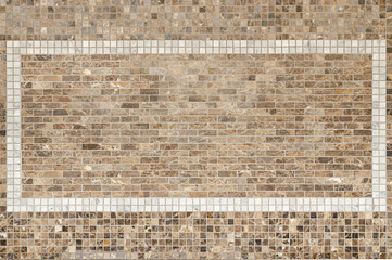 background of brown mosaic tile on decorative wall.