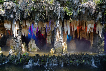 decorative cave with waterfall in Baomo Park, Guangzhou