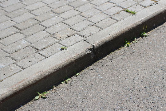 Curb on the street asphalt road.