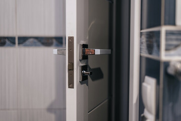 Half opened door into the cozy home interior