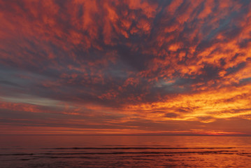 Naklejka premium the moment after sunset, when the sun has disappeared beyond the horizon