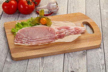 Raw pork bacon