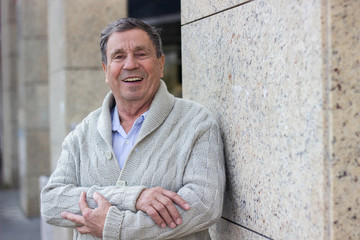 Obraz premium Portrait of happy senior man. Portrait of elderly man enjoying retirement