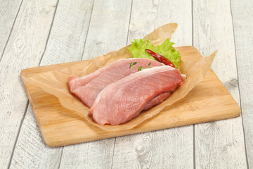 Juicy raw pork steak meat