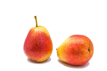 Two ripe juicy tasty pears on an isolated white background.