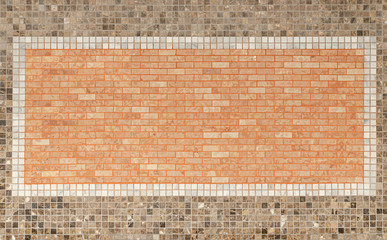 background of red and brown mosaic tile on decorative wall.