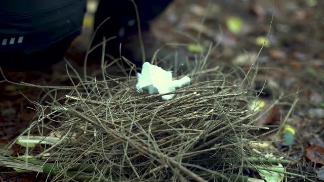 Starting a fire with a ferro rod and cotton wool