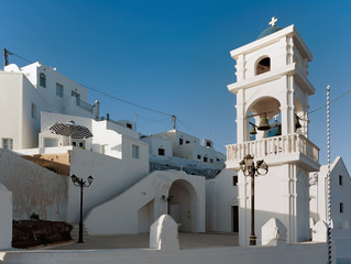 The little white church on Firostefani village in Santorini island, Greece