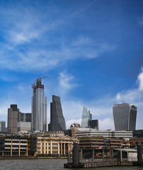 Fototapeta na wymiar A view across the River Thames to the skyline of London, UK.
