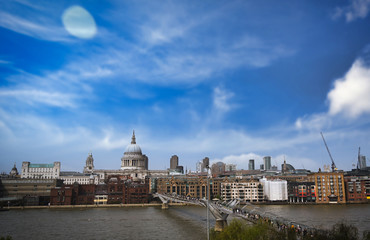 Naklejka premium A view across the River Thames to St. Paul's Cathedral and the skyline of London, UK.
