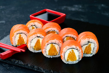 Japanese sushi with salmon and orange