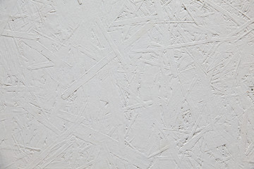 White wall for texture, background. The uneven surface of the background