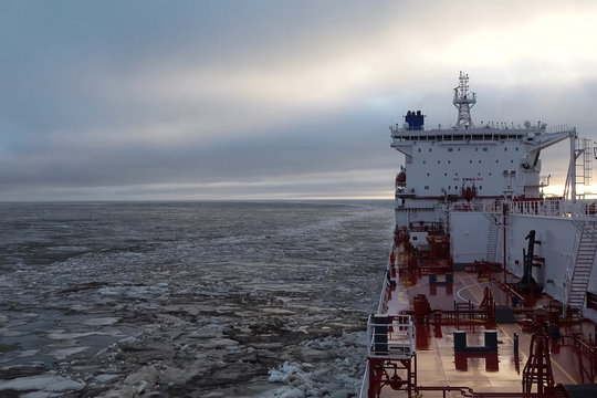 feed of a ship sailing in the Arctic. Landscape of the Arctic from the deck of the tanker.