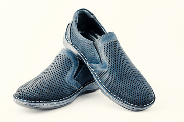 Men's blue shoes on a white isolated background