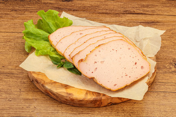 Boiled pork sausage over board