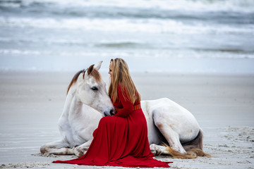 Girl and Horse On Beach